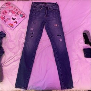 Patched skinny jeans